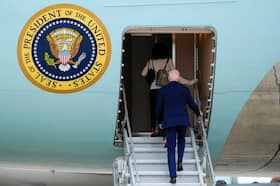 President Joe Biden boards Air Force One with granddaughter Natalie Biden.