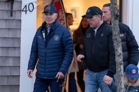 President Joe Biden and son Hunter Biden walk in downtown Nantucket, Massachusetts, on Friday.